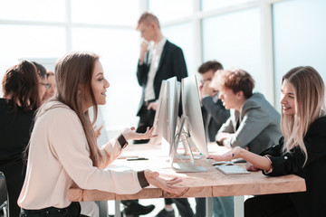 employees discussing ideas for a new project at a working meeting
