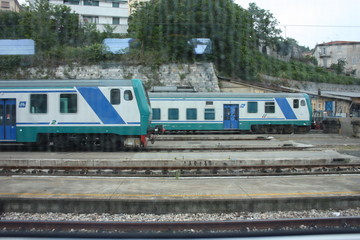 Fototapeta premium Italian regional train on the tracks near the station