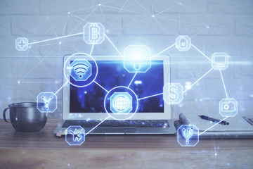 Computer on desktop with social network theme icon. Multi exposure. Concept of international connections.