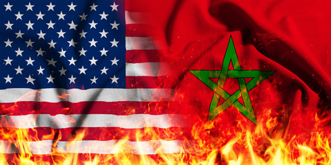 National flag of the United States with Morocco on a waving cotton with a fire texture 