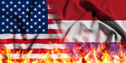 National flag of the United States with the Netherlands on a waving cotton with a fire texture 