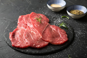 Fresh, thin beef steak with spices