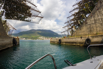 Fototapeta premium Fortified rock entrance for sheltering submarines in the Kotor Bay of the Adriatic