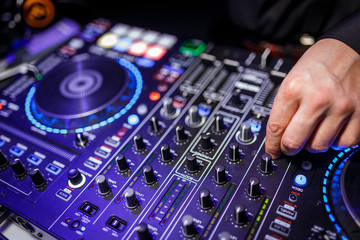 closeup view of a DJ's mixing desk