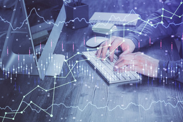 Double exposure of financial graph with man works in office on background. Concept of analysis.
