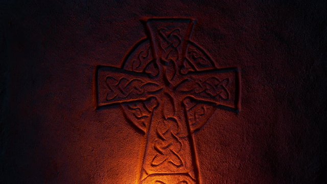 Christian Cross Old Rock Carving In Candlelight