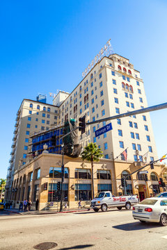 Orange Blvd Street Sign In Hollywood With Roosevelt Hotel In Background