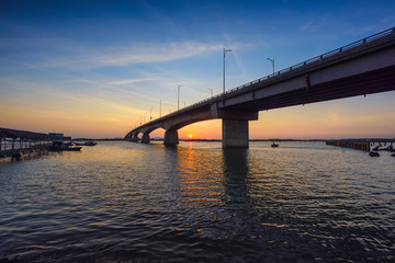 Fototapeta na wymiar The bridge on sunrise in Long Son, Vietnam.