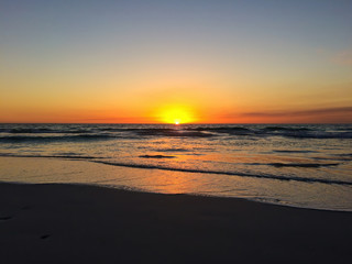 Fototapeta na wymiar Beautiful sunset on the beach in Western Australia, near city Perth