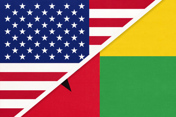 USA vs Guinea Bissau national flag from textile. Relationship between two american and african countries.