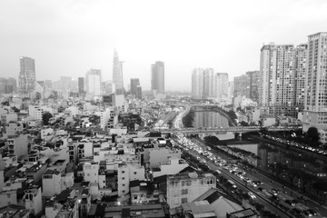 City of Saigon, Vietnam (Ho Chi Minh City). Black and white, elevated view during morning rush hour.