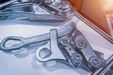 Wire clip. Wedge clamps for anchoring, pulling wires and steel cable