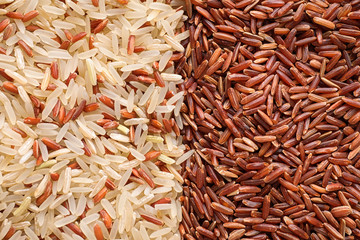 Mix of different brown rice as background, top view
