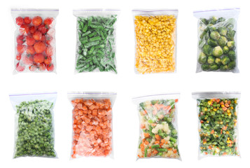 Fototapeta na wymiar Set of different frozen vegetables in plastic bags on white background, top view