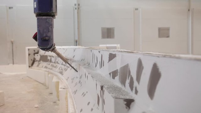 Industry Robot carwer machine - side view - carwing out fiber glass - boat factory