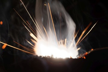 Macro photo of bursting gunpowder