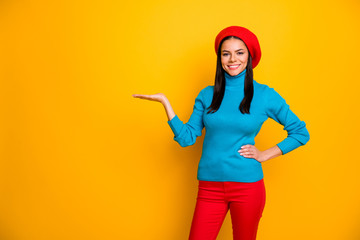 Fototapeta na wymiar Portrait of her she nice attractive cute confident cheerful cheery girl holding on palm copy space advert good solution isolated over bright vivid shine vibrant yellow color background