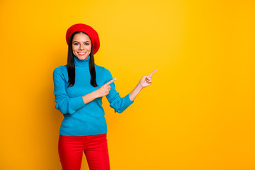 Fototapeta na wymiar Portrait of her she nice attractive lovely confident cheerful cheery girl showing ad advert modern shopping service copy space isolated over bright vivid shine vibrant yellow color background