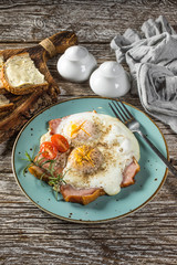 Fried eggs with pork ham.