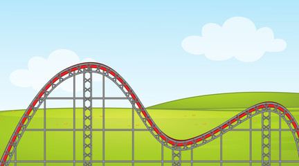 Background scene with empty roller coaster track in the park