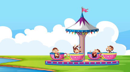 Scene with happy monkeys playing in the cup spin