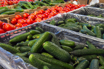 sale of tomatoes and cucumbers in the vegetable department