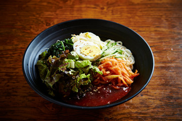 Korean mixed soba noodle with spicy sauce 