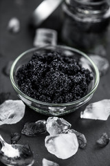 Some fresh Black Caviar (selective focus; close-up shot)