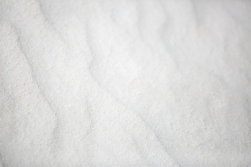 Obraz premium White sand background natural pattern, nature texture background