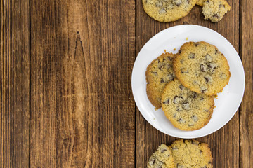 Chocolate Chip Cookies (fresh made) as detailed close-up shot; selective focus