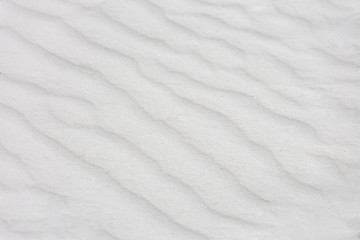 Obraz premium White sand background natural pattern, nature texture background