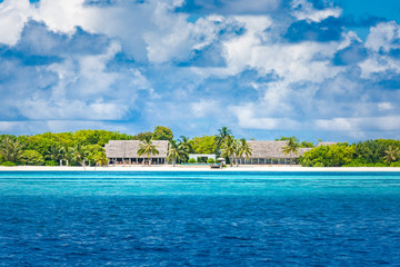 Beautiful tropical Maldives resort hotel and island with beach and sea on sky for holiday vacation...
