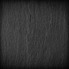 Dark grey black slate background or texture.
