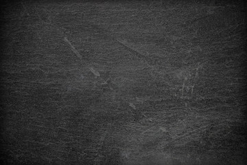 Dark grey black slate background or texture.