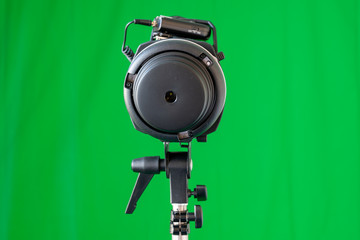 Flash light in front of a green screen