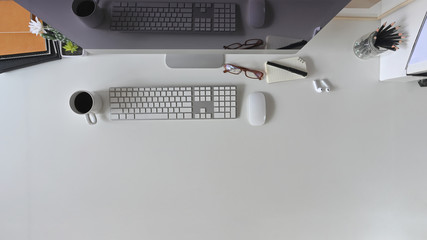 Image of black screen computer monitor on the modern working table. including office equipment on table. Modern office working desk concept.