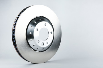 backdrop with brake disk on white background with copy space