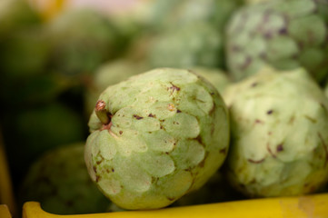 Obraz premium Custard apple or green ripe cherymoia exotic fruit