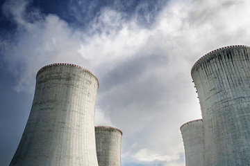 Cooling towers of nuclear power plant, summer day with cloudy sky, Dukovany, Czech Republic