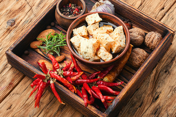 Homemade feta cheese with herbs