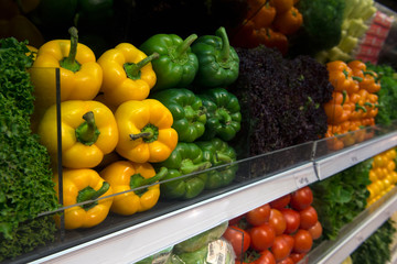 sale of sweet pepper, yellow tomatoes, lettuce, vegetable department, grocery store