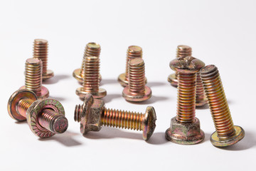 Rusty screw and nuts isolated on white background. Bolts and nuts