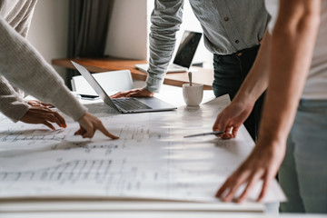 Image of multiethnic young business people working together at office