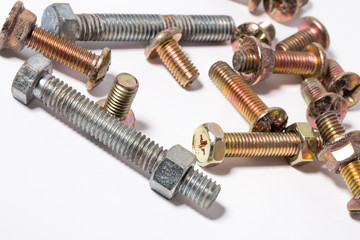Rusty screw and nuts isolated on white background. Bolts and nuts