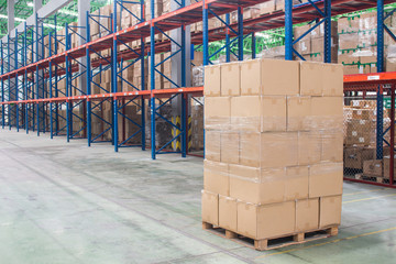 Rows of material boxes or product boxes in warehouse area.