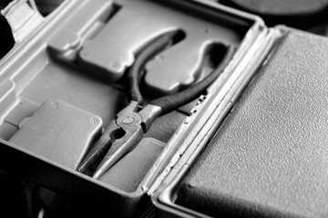 Pliers. Forceps Tool. The texture of the metal. Detail. Aluminum. Stainless steel. Silver background. Men's work.