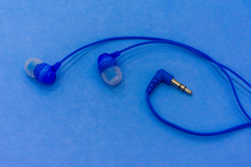 headphones on a blue background