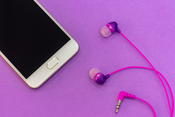 headphones on a purple background