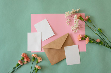 blank card in an envelope with flowers