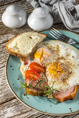 Fried eggs with pork ham.